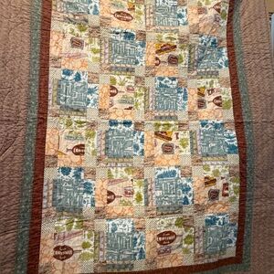 Patchwork Quilt with Blue and Brown Accents